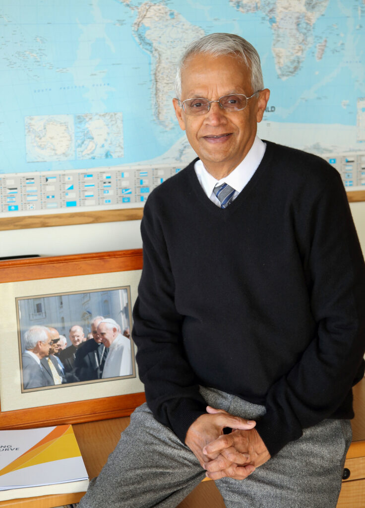 Ramanathan in front of world map. Photo: Glenn Marzano